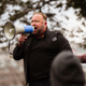 Alex Jones speaking outside the Capitol after Donald Trump supporters assaulted police and broke into the building en masse on Jan. 6, 2021.